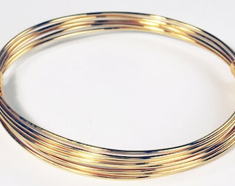 Gold elephant hair style 5 strand gold knot bracelet