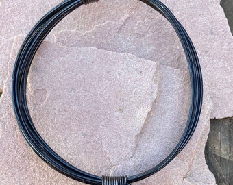 All black 5 strand  African artificial elephant hair bracelet with 2 sterling silver antiqued knots