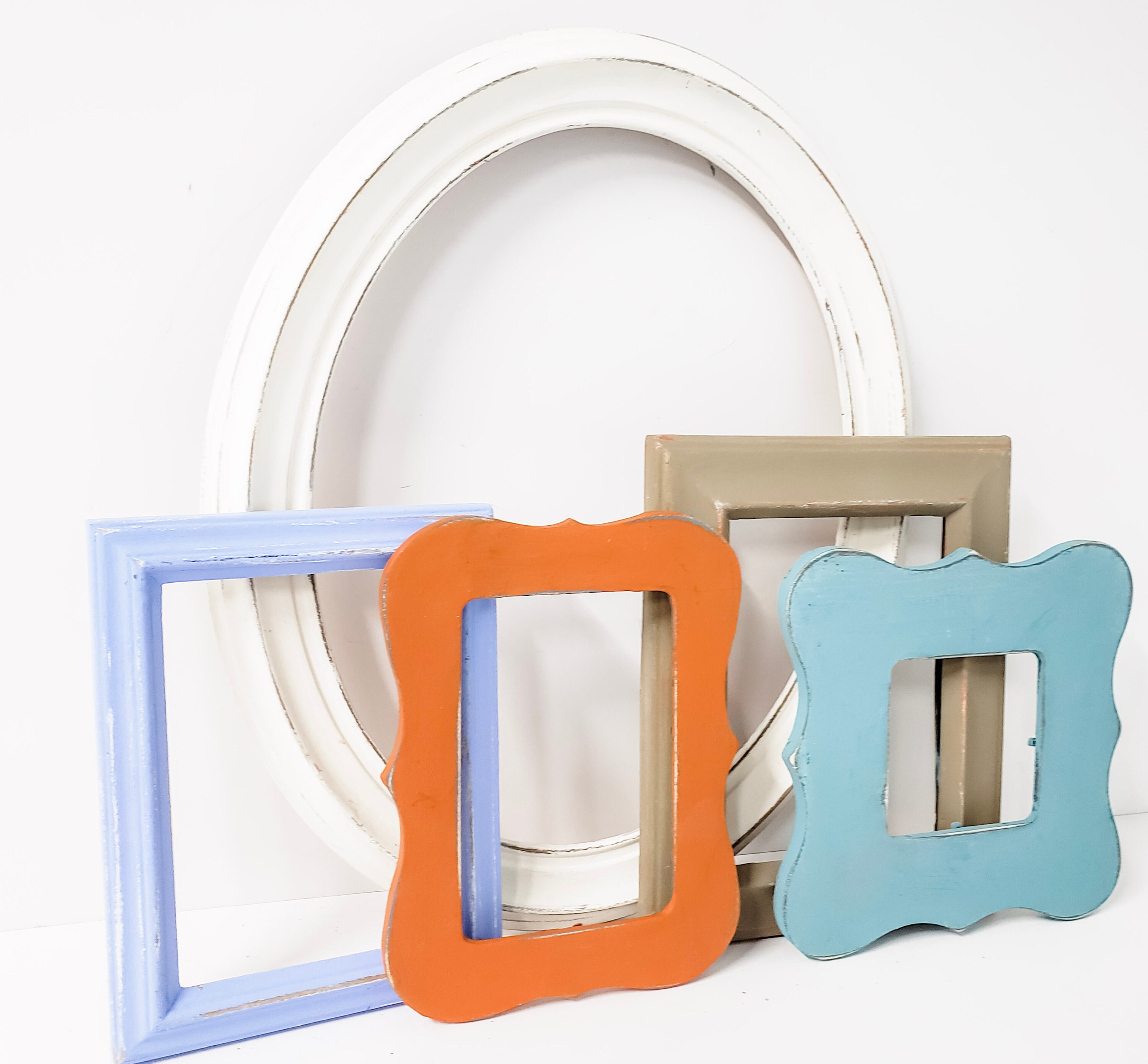 Artful Display of Mixed Picture Frames in a Modern, Rustic Color