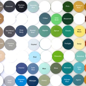 May include: A collection of circular color swatches, each labeled with a unique name. Colors range from metallic silver to deep red, including shades of blue, green, and brown. Ideal for paint or design inspiration.