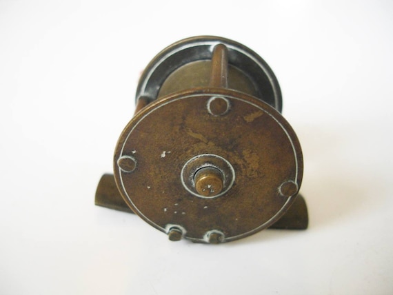 antique brass fishing reel Fly Pull, Brass, Model 298AB Can anyone I.d this brass