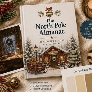 以下が含まれることがあります： 「The North Pole Almanac」というタイトルの本。表紙には雪に覆われた小屋、そり、松の木が描かれています。この本にはCTRL + PIX + PRTによる15色の厳選されたカラーが含まれています。カラーパレットカード、書斎の写真、クリスマスのオーナメントが添えられています。