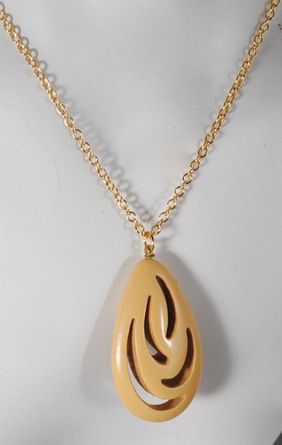 Vintage Carved Pendant Ivory Colored Resin 1960s