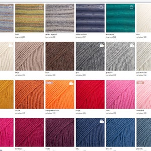 May include: A variety of yarn colors in skeins, including white, beige, brown, gray, mustard, orange, red, pink, fuchsia, burgundy, violet, blue, and gray. The yarn is arranged in rows of six colors each.