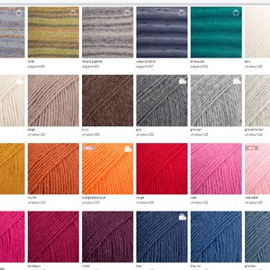 May include: A selection of yarn colours in skeins, including white, beige, brown, grey, mustard, orange, red, pink, fuchsia, burgundy, violet, blue, and grey. The yarn is arranged in rows of six colours each.