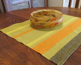 Handwoven cotton centerpiece mat/ bread basket liner/ towel in fiesta lime, lemon,  orange & blue