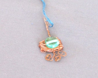 Copper wire and glass bead necklace is handwoven