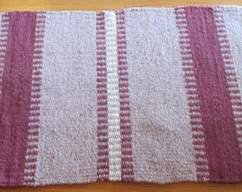 Heavy handwoven wool rug is made to last!
