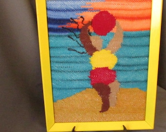 Handwoven tapestry "Beach Ball Belle I" features bright Crayon colors.