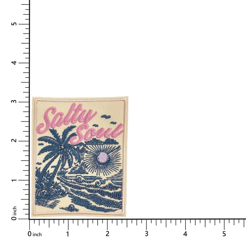 May include: Embroidered patch with a beach scene. The patch features a palm tree, waves, and a sun with the text "Salty Soul" in pink. The patch is rectangular and measures approximately 2.5 inches by 2 inches.