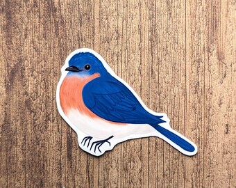 May include: A bluebird sticker with a blue body, white chest, and orange throat. The bird is perched on a branch with its wings spread out.