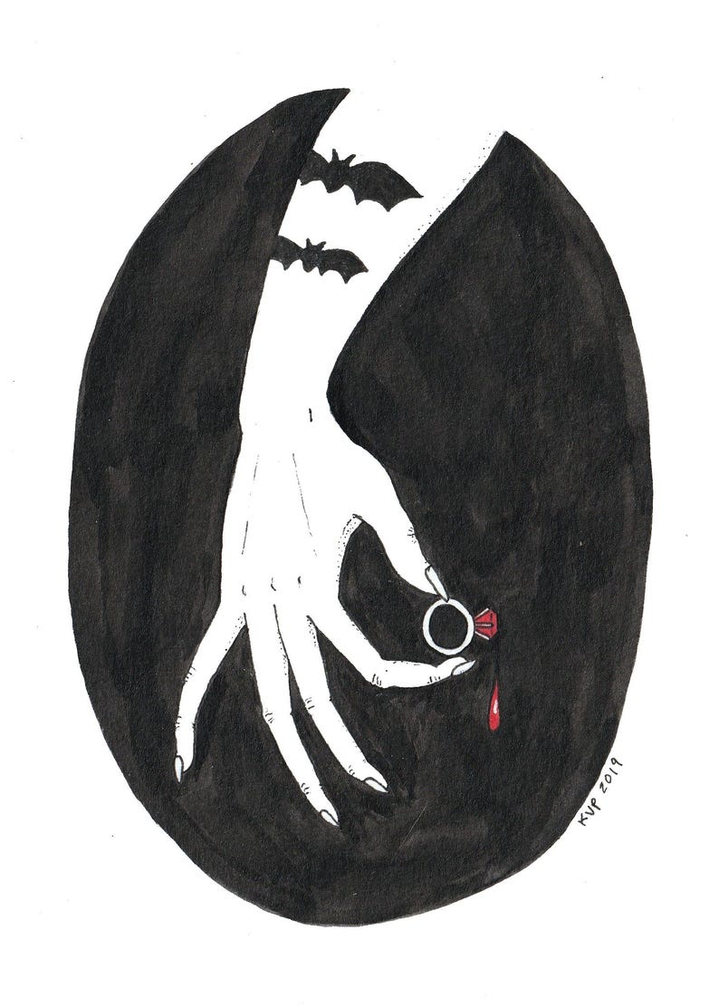 May include: A hand with long fingers holds a silver ring with a red gemstone. A single drop of blood falls from the ring. The hand is silhouetted against a black background with two bats flying in the upper left corner. The text "KUP 2019" is in the lower right corner.