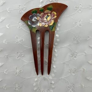 Oriental comb with hand-painted flower motif