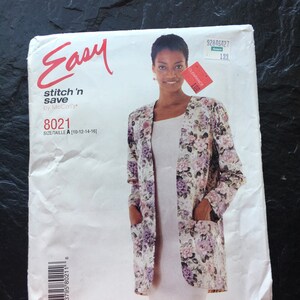 May include: A sewing pattern for a floral print jacket with a white dress underneath. The pattern is labeled "Easy stitch 'n save by McCall's" and the pattern number is 8021. The size is A (10-12-14-16).
