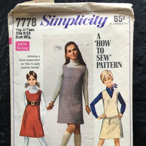 May include: A vintage Simplicity sewing pattern for a dress, featuring three illustrations of young women wearing different styles of dresses. The pattern number is 7778 and the price is 65 cents. The pattern is titled "A 'How To Sew' Pattern".
