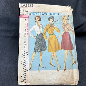 May include: Vintage Simplicity sewing pattern number 5610, a "How-to-Sew" pattern for a skirt. The pattern is for half sizes 18 1/2 and bust 39. The pattern is printed in Canada and costs 65c.