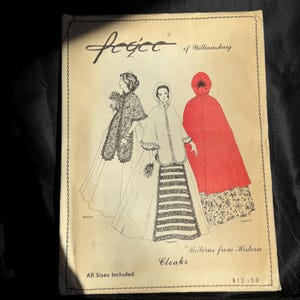 May include: A vintage sewing pattern envelope titled Fecce of Williamsburg Patterns from Historic Cloaks. The cover features black and white line illustrations of three cloaks, including one in red, with the text Palatine, Capuche, and Cardinal.