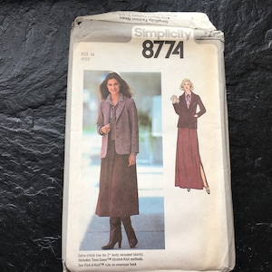 May include: Simplicity sewing pattern number 8774 for a skirt and jacket. The pattern is for size 14 miss. The pattern shows a woman wearing a brown skirt and jacket and a second woman wearing a brown skirt and jacket with a slit up the side.