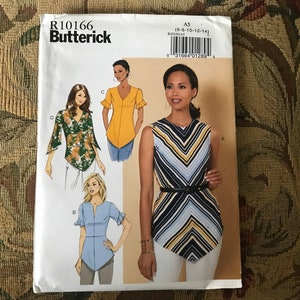 May include: A sewing pattern for a women's top with four different styles. The pattern is from Butterick and has the number R10166. The pattern is for sizes 6-8-10-12-14.
