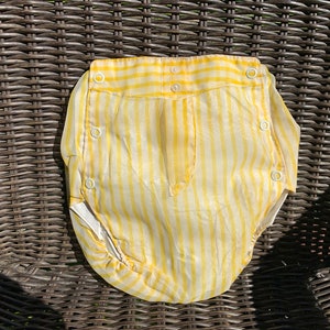 Vintage &quot;Cutie-Pants&quot; Nylon Diaper Cover // Medium &gt; sheer yellow and white striped organza over plastic &gt; original tag &gt; mock fly, buttons
