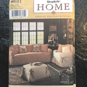 May include: A Simplicity Home pattern for loose-fit slipcovers and pillows. The pattern shows a sofa, chair, and ottoman with beige slipcovers. The pattern includes five slipcovers, pillows, and an ottoman.