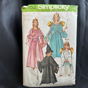 May include: Simplicity sewing pattern number 5052 for children's costumes. The pattern includes instructions for making a witch, angel, and princess costume. The pattern is for sizes 6-8, child/girl.