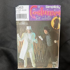 May include: Simplicity costume pattern featuring two adult costume designs. The pattern includes the text "Costumes for adults" and the size information "AA XS, S, M, UR XP-M, FR TP-M". The image shows two men in costume.
