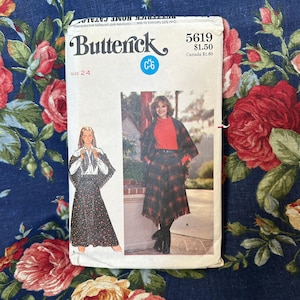 May include: A vintage sewing pattern for a skirt, featuring two models wearing different styles. The pattern is from Butterick, size 24, and has a price tag of $1.50. The pattern is on a white background with a floral design.