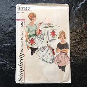 May include: Simplicity sewing pattern number 4737, one size, printed pattern 50c. The pattern shows three different styles of aprons with a floral design. The aprons are white, pink, and red.