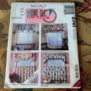 May include: McCall's Home Dec In-A-Sec pattern 5741 for a 2-yard window topper. The pattern includes instructions for a bell topper, a scalloped topper, and a crescent topper. The pattern is for one envelope.