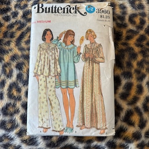 May include: Vintage sewing pattern for a nightgown or pajama set. The pattern is for size medium and includes three different styles. The pattern is from Butterick and has the number 3960 on it.