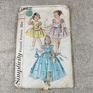 Vintage 1950s Child&#39;s Dress Pattern // Simplicity 1862 &gt; Sz 5 &gt; full skirt, puff sleeves, V shape trim front, lace ruffles, sheer overskirt