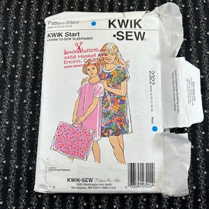 May include: A sewing pattern for a sleepshirt, featuring a girl wearing a colorful sleepshirt. The pattern is from Kwik Sew and is for sizes 8-10-12-14-16. The pattern is titled "Kwik Start Learn-to-Sew Sleepshirt".
