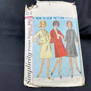 May include: A vintage Simplicity sewing pattern for a dress and jacket. The pattern is for size 18, bust 38, and is printed in Canada. The pattern includes a "how-to-sew" guide.