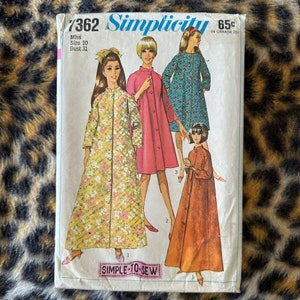 May include: Simplicity sewing pattern number 7362 for a miss size 10 with a bust measurement of 31 inches. The pattern includes four different styles of long, button-up robes with long sleeves. The robes are shown in yellow, pink, blue, and orange.
