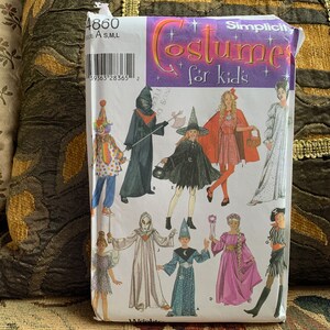 May include: A Simplicity pattern for children's costumes. The pattern includes designs for a witch, a clown, a pirate, a fairy, a princess, a ghost, a wizard, and a red riding hood. The pattern is for sizes S, M, and L.
