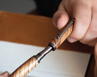 Handcrafted Premium Zebrawood Fountain Pen by Autumn Woods Co featuring a 16K Gold & Iridium Fountain Nib