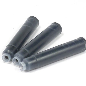 May include: Three black ink cartridges for fountain pens. The cartridges are made of plastic and have a clear plastic tip.