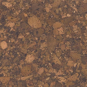 Può includere: Primo piano di una superficie in sughero dall'aspetto naturale e strutturato. La superficie è composta da varie tonalità di marrone e beige, con forme e motivi irregolari. Il sughero ha un'estetica rustica e organica.