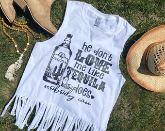 Camiseta sin mangas de música country / Camiseta sin mangas con flecos / Camisetas de conciertos / Camiseta "Él no me ama" / Camiseta de tequila / Camiseta sin mangas / Camiseta sin mangas de estilo suave / Verano