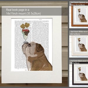 May include: A framed print featuring a bulldog with a whimsical ice cream cone on its nose. The artwork is set against a vintage book page background and is available in a 14x11 inch (35.5x28cm) mount with caramel, white, or black wood frames.