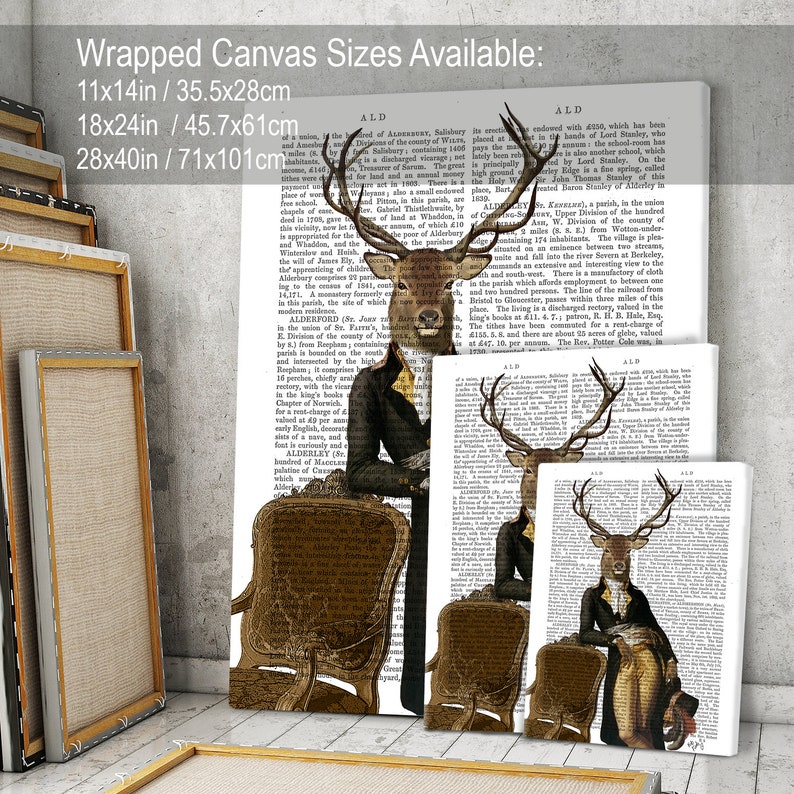 May include: A set of three wrapped canvas prints featuring a deer wearing a suit and holding a book. The deer are depicted against a background of vintage text. The canvas sizes are 11x14 inches, 18x24 inches, and 28x40 inches.