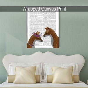 May include: A wrapped canvas print featuring a pair of foxes with floral crowns, looking at each other. The background is a vintage book page with text.