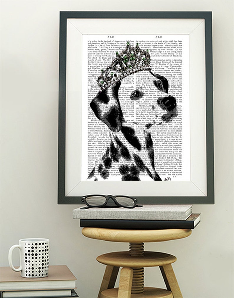 May include: Black and white illustration of a Dalmatian dog wearing a jeweled crown. The dog is looking to the right. The illustration is superimposed on a page of text.