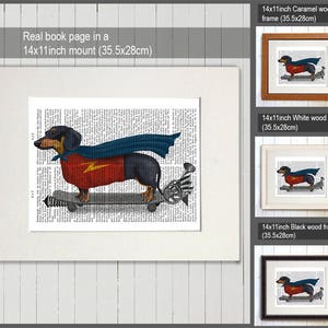 May include: A black and tan dachshund wearing a red and blue superhero costume rides a skateboard on a page from an old book. The image is framed in a 14x11 inch mount.
