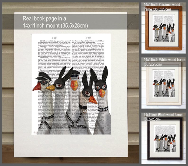 May include: Five white geese wearing black leather masks and harnesses. The geese are arranged in a row, with the one in the center wearing a bunny mask. The image is printed on a book page with text in the background. The image is framed in a white wood frame.