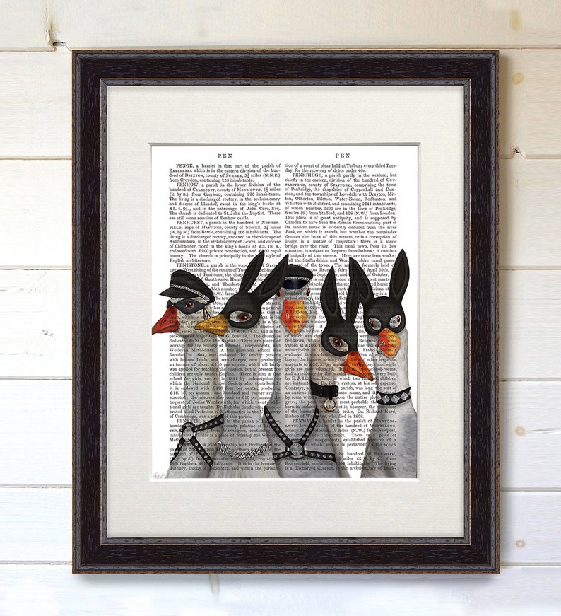 May include: Five geese wearing black and white masks and leather harnesses. The geese are standing in a row on a page of text from an old book. The text is about the history of the town of Penge, England.