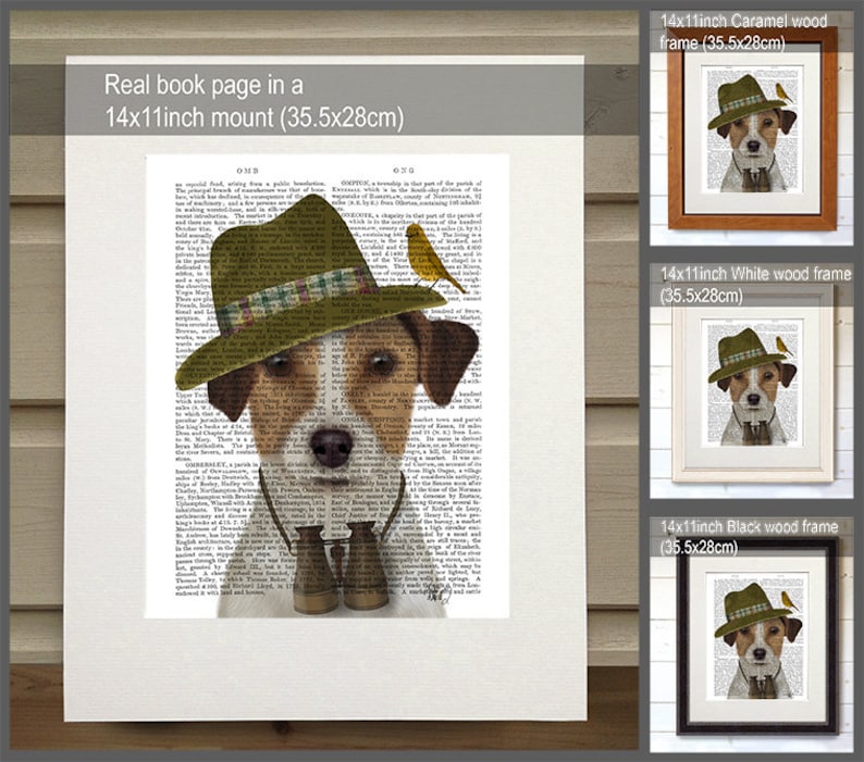 May include: A Jack Russell terrier wearing a green and brown hat, a necktie, and binoculars. The dog is standing on a book page with text. The image is framed in a caramel wood frame. The image is also available in white and black wood frames.
