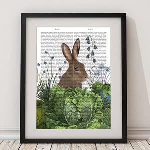 May include: A brown rabbit peeking out from behind a bed of green leafy plants and blue flowers. The rabbit is looking to the right of the image. The background is a vintage book page with text.