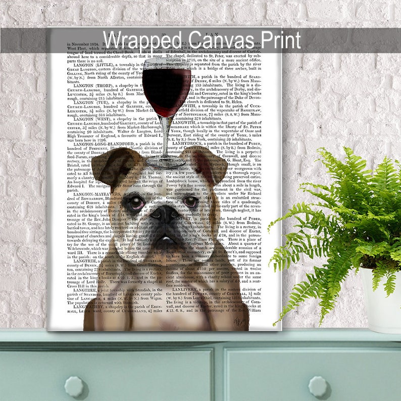 May include: A vintage book page with text about Langton, England, featuring a bulldog illustration with a glass of red wine. The bulldog is brown and white with a black nose and a red collar.